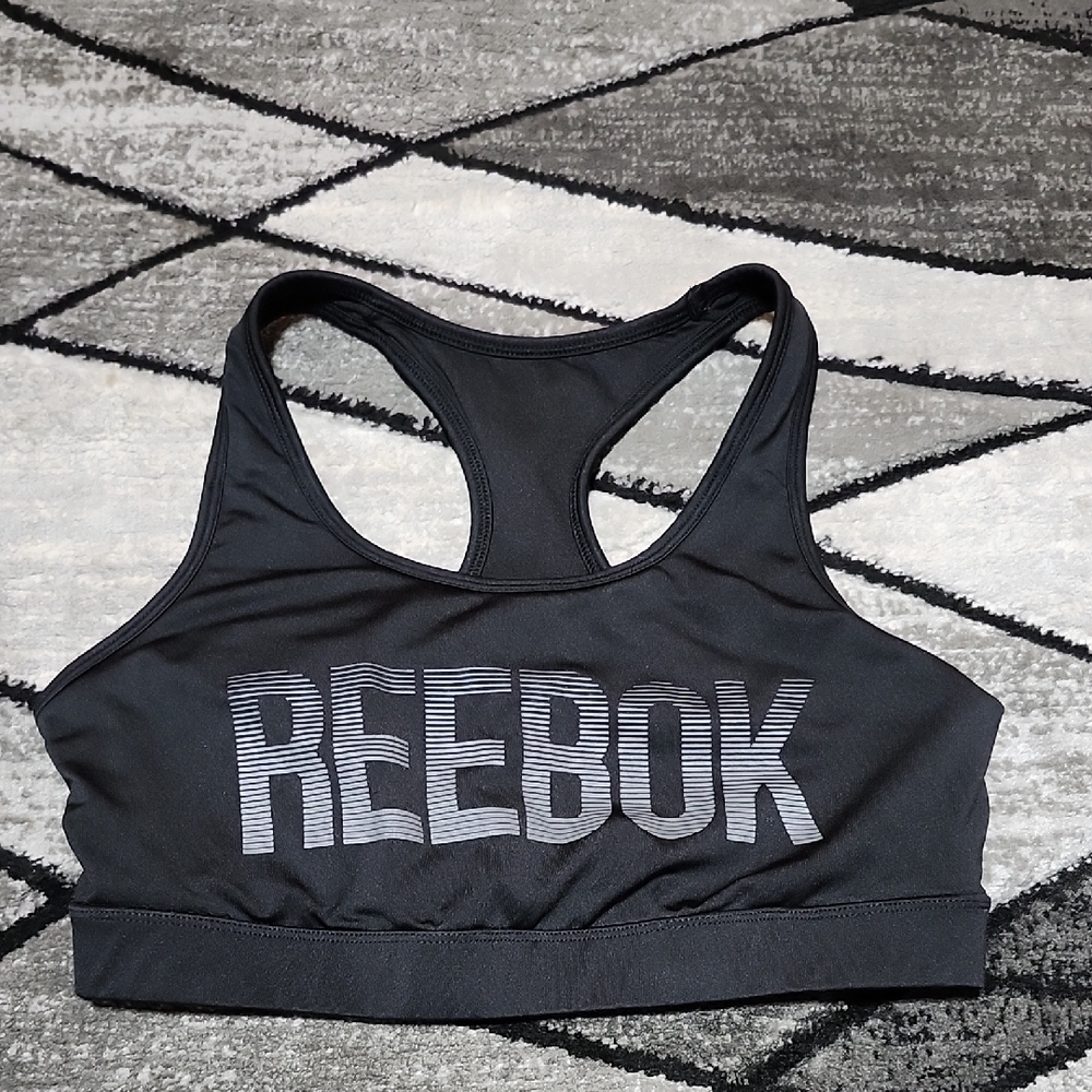 REEBOK CORE GRAPHIC BLACK LIGHTLY LINED REFLECTIVE LOGO SPORTS BRA